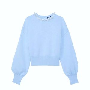 Spring season Kate Spade New York (North Star) blue sweater.